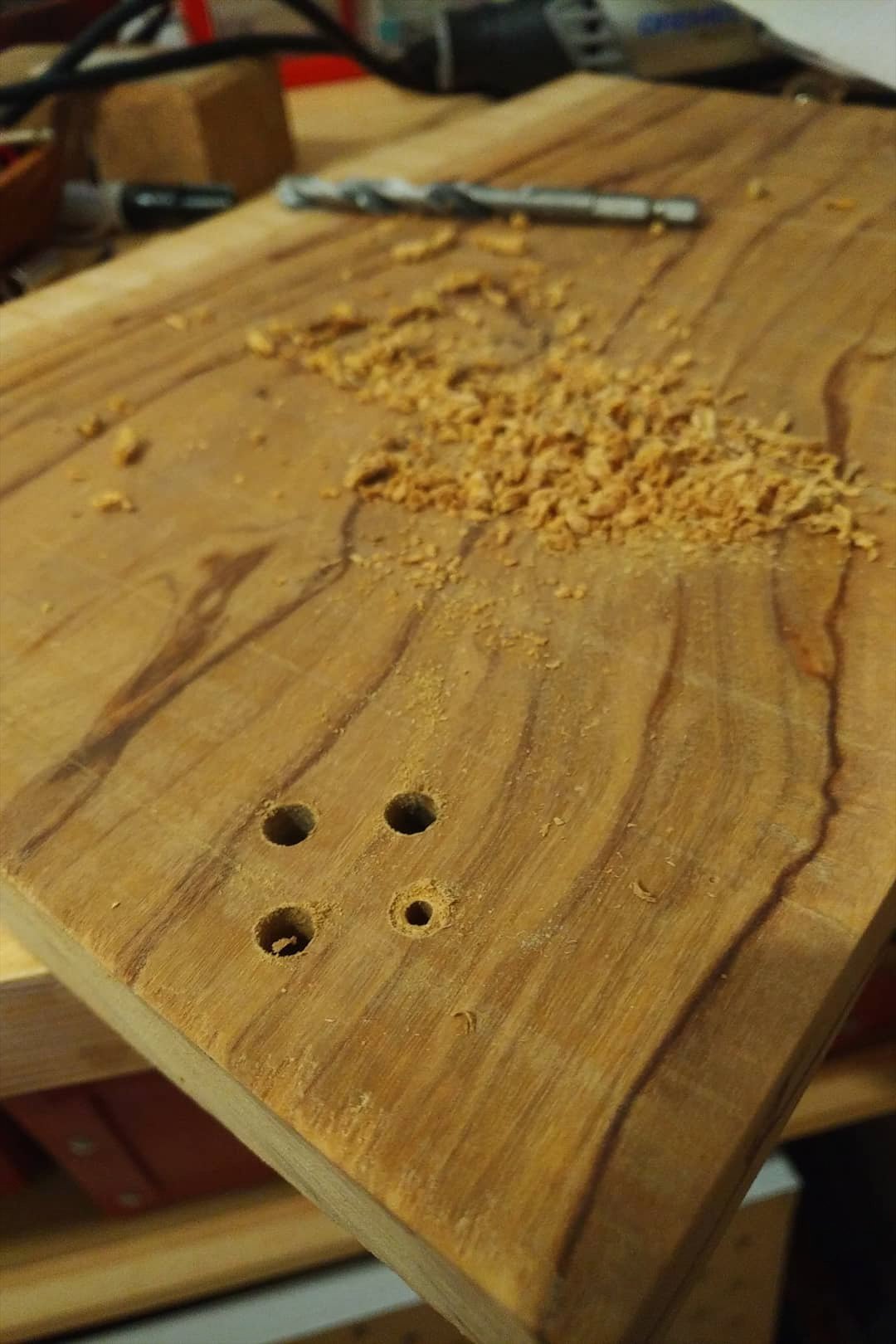 When I was sure about the layout, I started drilling holes for the jacks.